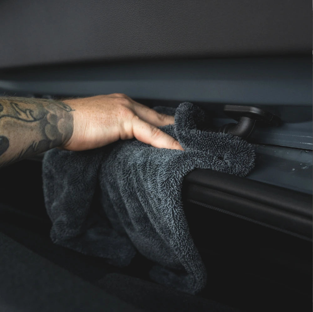Drying a car door shut with the Dry Guy Mini microfibre towel