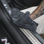 Dry Guy Mini towel drying a car door sill and shut line