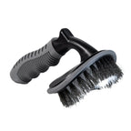 Deluxe Detail tyre cleaning brush with stiff black bristles and a grip handle