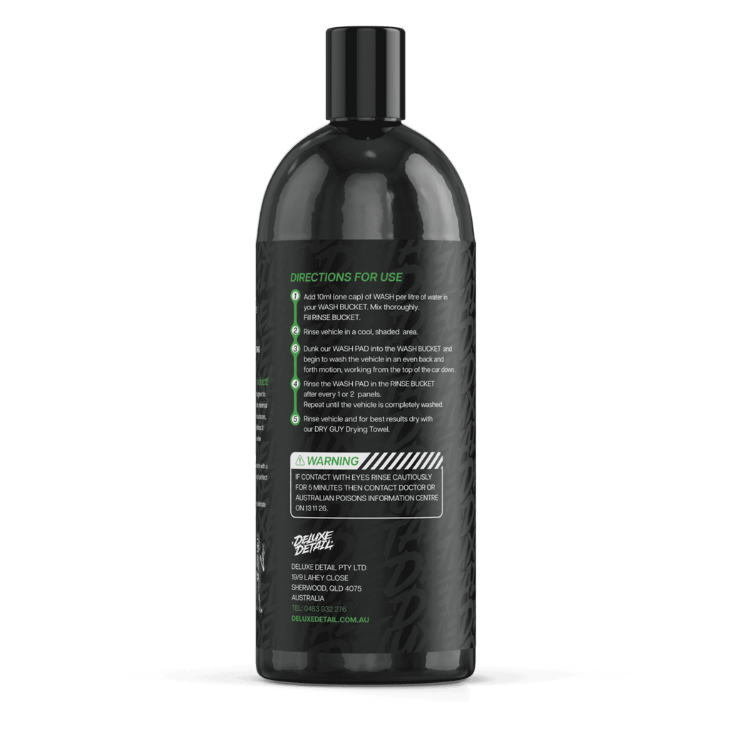 Back label of Deluxe Detail WASH car wash showing dilution directions and safety warning