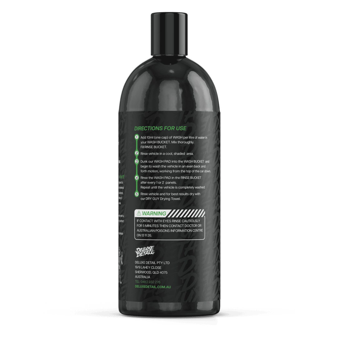 Back label of Deluxe Detail WASH car wash showing dilution directions and safety warning