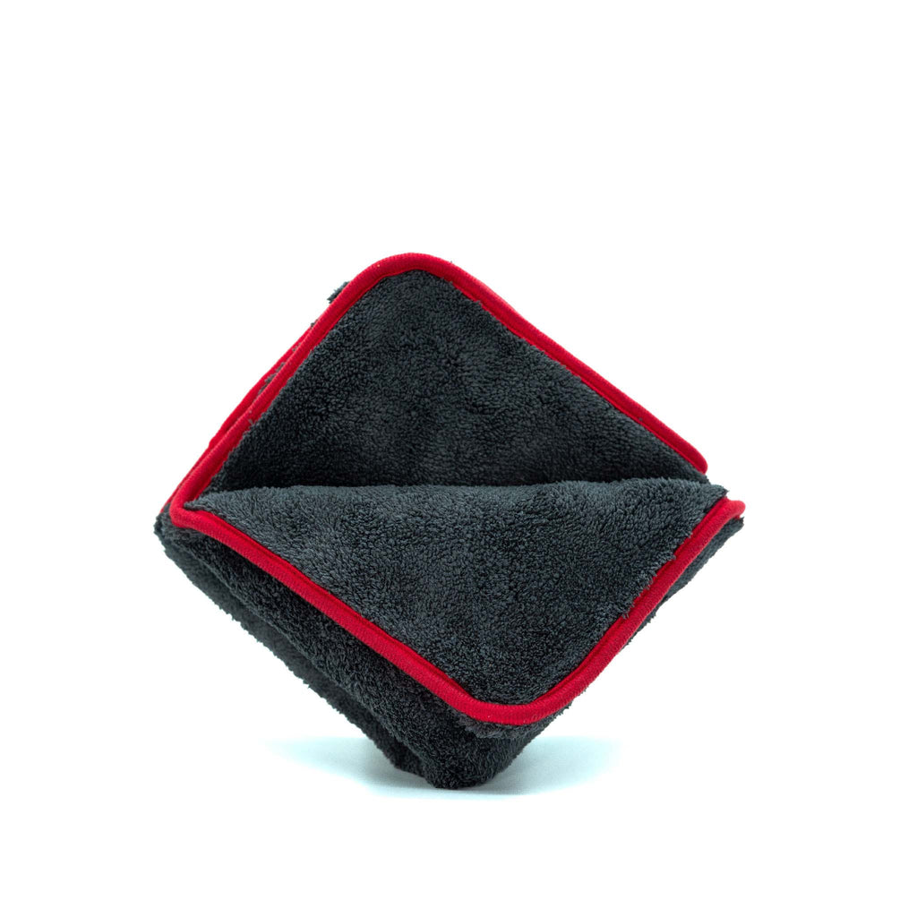 Deluxe Detail plush microfibre paint prep cloth with red edging, folded on a white background